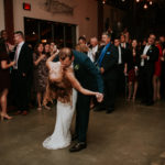 newlyweds dancing in event space rental